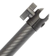 an aluminum and carbon fiber pen with a metal clip on the end, resting on a white background