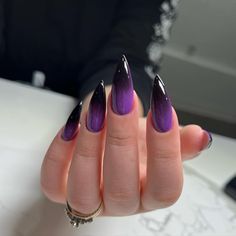 Hey, nail lovers! Today, we're jumping into the world of black and purple nails - a combo that's as bold as it is mysterious. As a nail enthusiast who's tried #gelnaildesigns Black And Purple Ombre Nails Almond, Halloween Nails Black And Purple, Nails Gothic Ideas, Purple Fade Nails, Purple Nail Ideas