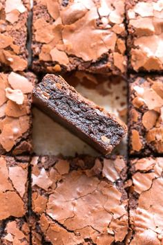 chocolate brownies cut into squares on top of each other