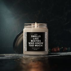 a candle that says smells like bees who know too much on the front and side