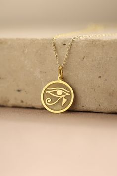 Gold Eye Of Ra Pendant - Eye Of Ra Gold Necklace ● Material of pendant: Solid Gold 14k ( REAL GOLD ) ● Metal Stamp: 14k ( REAL GOLD ) ● The pendant is available in 5 sizes: - 12,7 mm / 0.5 inches (Diameter) - 14,0 mm / 0,55 inches ( Diameter ) In the photos - 15,3 mm / 0.6 inches ( Diameter ) - 16,5 mm / 0,65 inches ( Diameter ) - 19,1 mm / 0,75 inches ( Diameter ) ( In the photos the size is 14mm / 0.55 inches Diameter ) ( Jump Ring inner diameter: 4 mm ) ● Material of chain: Solid gold 14k ( R Ancient Egyptian Necklace, Eye Of Horus Pendant, Magick Symbols, Money Collection