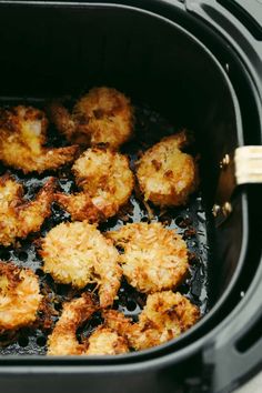 fried food being cooked in an air fryer