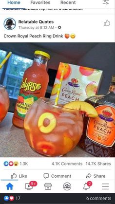 two glasses filled with drinks sitting on top of a counter