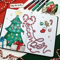 an open christmas card with candy canes and other holiday decorations on top of it