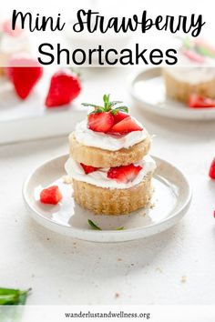 mini strawberry shortcakes on a white plate with strawberries in the background and text overlay that reads, mini strawberry shortcakes