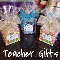 two gift boxes with tea bags tied around them and the words teacher gifts on top