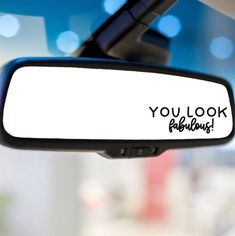 you look fabulous written on the side mirror of a car