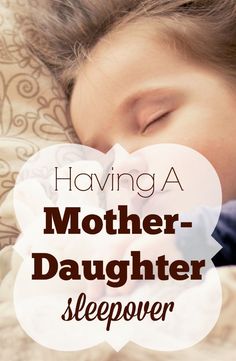 a young child sleeping on top of a bed with the words having a mother - daughter sleep