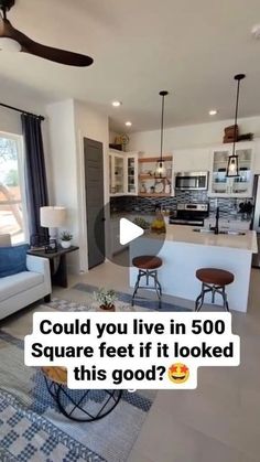 a living room filled with furniture and a ceiling fan