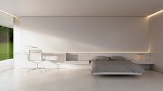 a modern bedroom with white walls and flooring