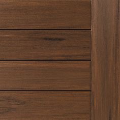 a close up view of the wood grains on this cabinet door's surface