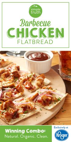 an advertisement for chicken flatbreads on a cutting board with dipping sauce in the background