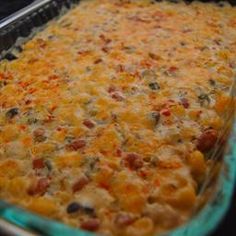 a casserole dish with cheese and other toppings