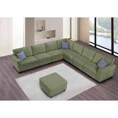 a living room with a sectional couch and ottoman