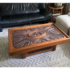 a coffee table with an intricate design on it