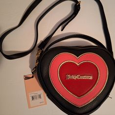 Dress Up Your Holiday Style With This Perfect: Juicy Couture Heart Shape Crossbody Bag In Black/Multi. With Studs Design. 3 Credit Card Slots Inside. Black Heart-shaped Bag With Adjustable Strap, Cute Black Bags For Valentine's Day, Juicy Couture Bags, Small Crossbody Bag, Licorice, Holiday Fashion, Juicy Couture, Crossbody Bag, Heart Shapes