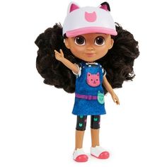 the doll is wearing a blue dress with a pink kitty hat on it's head