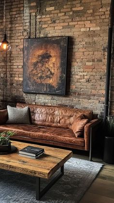 a living room with brick walls and leather furniture