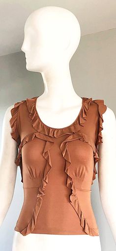 Beautiful TOM FORD for YVES SAINT LAURENT Rive Gauche YSL terra-cotta / tan jersey ruffle top! Simply slips over the head, and stretches to fit. Flattering ruffles throughout. Expertly well made, with heavy attention to detail. (93% Rayon, 7% Fitted Brown Ruffled Tops, Fitted Brown Tops With Ruffles, Fitted Brown Ruffle Top, Rive Gauche, Ruffle Top, Sleeveless Blouse, Tom Ford, Ruffles, Yves Saint Laurent