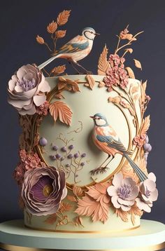 a cake with flowers and birds on it