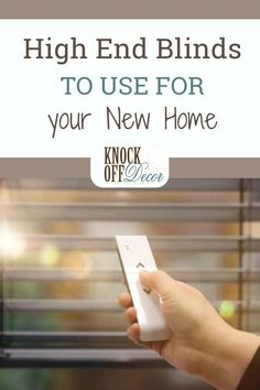 a hand holding a remote control in front of a window with the words high end blinds to use for your new home