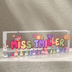 a sign that says miss miller on it with an owl and princess theme in the background