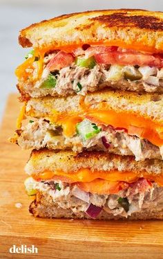 a grilled cheese sandwich with meat and vegetables