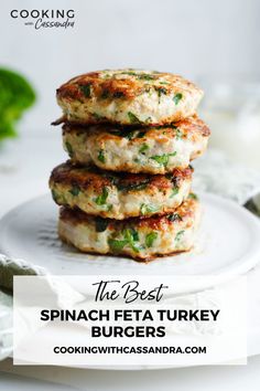 the best spinach feta turkey burgers on a white plate with text overlay