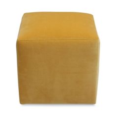 a yellow foot stool on a white background