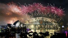 fireworks are lit up over the sydney opera