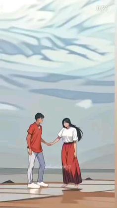 two people holding hands while standing on a beach with mountains in the background and sky