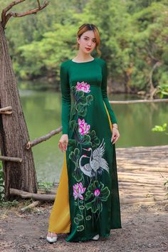 If you want to change the color, change hand-painted pattern on the Ao dai or any other request, please send us a message. We tailor ao dai to the measurements you provide to make sure they fit perfectly. Please provide the number according to the photo guide. Ao Dai is the traditional costume of Vietnamese women sewn with very soft and comfortable silk, highlighting the feminine beauty with the softness and curves of the body. For this hand-painted collection, we use high-quality silk that is s Green Long Ao Dai For Spring, Festive Green Long Sleeve Ao Dai, Festive Green Ao Dai With Long Sleeves, Traditional Green Ao Dai For Festive Season, Festive Green Long Ao Dai, Festive Long Green Ao Dai, Vietnamese Traditional Clothing, Ao Dai Vietnamese, Vietnamese Ao Dai