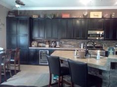 the kitchen is clean and ready to be used as a dining room or living room