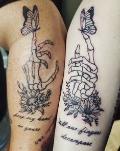 two people with tattoos on their arms