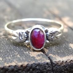 Handmade, Natural Raw (untreated) Ruby Sterling Silver Botanical Ring Featured in this listing are Sterling Silver, handmade, natural stone rings. These lovely ring feature a beautiful, Natural untreated Ruby oval 6x4(approx.) stones. All hand set into .925 Sterling Silver. Please note that there will be natural inclusions, as this ring is untreated, and in it's purest form. There are slight color difference due to nature of each unique stone. Detailed leaf design along each side of the stone, w Silver Ruby Stackable Ring, Spiritual Red Ruby Ring In Sterling Silver, Silver Ruby Ring Stackable, Heirloom Handmade Sterling Silver Ruby Ring, Spiritual Sterling Silver Ruby Promise Ring, Handmade Heirloom Ruby Ring In Sterling Silver, Handmade Heirloom Sterling Silver Ruby Ring, Handmade Sterling Silver Ruby Promise Ring, Handmade Spiritual Ruby Ring In Sterling Silver