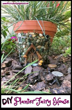 a fairy house made out of rocks and plants in a garden with text overlay that reads diy planter fairy house