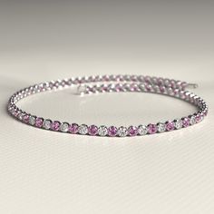 Pink Sapphire & Diamond Alternate Tennis Bracelet in 14K/18K White Gold Luxury Pink Tennis Bracelet In Fine Jewelry Style, Pink Diamond Wedding Bracelets, Formal Pink Bracelets With Diamond Accents, Luxury Pink Diamond Bracelet For Anniversary, Pink Fine Jewelry Bracelets For Wedding, Pink Fine Jewelry Bracelet For Wedding, Pink Bracelets With Sparkling Stones, Pink Diamond Bracelet For Gift, Fine Jewelry, Pink Diamond Bracelet For Wedding