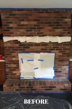 a brick fireplace with the words before and after taped to it