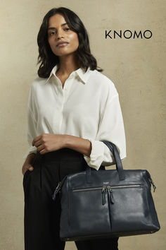 Knomo Audley - a sophisticated and modern take on the classic tote and shoulder bag for women Made of genuine cowhide leather with gold-plated zippers and hardware. The purse interior features a fully lined bright polyester lining that will stand up to daily use. Plating