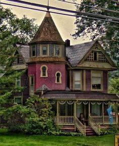 an old victorian style house in the country