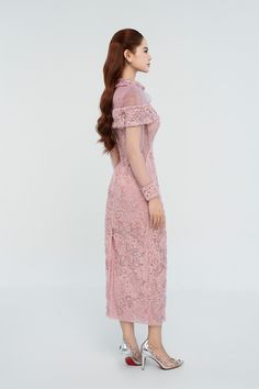 This dress exudes elegance and sophistication. The sheath silhouette flatters the figure, while the cape shoulder adds a touch of drama. The intricate lace detailing provides a classic touch to the modern design. Perfect for a special occasion or a night out, this dress is a timeless addition to any wardrobe. Types Of Lace, Lace Cuffs, Lace Midi, Lace Midi Dress, Lace Fabric, Designer Collection, Lace Detail, Online Fashion, Pink Floral