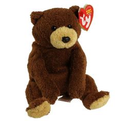 a brown teddy bear with a red heart on it's ear sitting in front of a white background