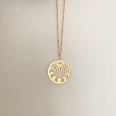 Gold moon phase, sun charm / pendant necklace with a 5cm extended chain (total 45cm), so it is adjustable. This necklace is a hypoallergenic, minimalist and dainty necklace, perfect for layering with another chain! The pendant sits slightly above your breast bone. This is a handmade and packed by myself :)  This has a stainless-steel chain + charm, so it will not fade when it comes into contact with water. In case your jewellery comes into contact with water/liquids, quickly take a cloth and wipe it dry, your necklace should not tarnish or oxidise! I would not recommend showering/ constantly exposing this necklace to water, to make sure the charm, the chain and other components keep their gorgeous shine! The charms may have a few scratches on the surface, however, they are not prominent an Everyday Moon Phase Pendant Necklace, Adjustable Moon Phase Celestial Necklaces, Adjustable Moon Phase Celestial Necklace, Adjustable Sun And Moon Design Necklace, Adjustable Celestial Round Pendant Jewelry, Everyday Adjustable Sun And Moon Design Necklace, Round Adjustable Necklace With Sun And Moon Design, Adjustable Round Sun And Moon Design Necklace, Minimalist Adjustable Sun And Moon Jewelry