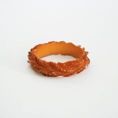 "vintage bakelite bracelet luminous butterscotch deeply carved & detailed leaf design crafted by true artisan very rare & collectible piece circa 1940's condition: very good measures approx: inner diameter : 2.5\" width: approx. .75\" circumference: 7.85\" item is vintage and is in used condition layaway is available ! message for more details" Far Rockaway, Bakelite Bracelets, Vintage Bakelite, Leaf Design, Very Rare, Design Crafts, Leather Bracelet, Bangles, Carving