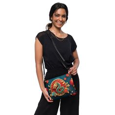 🐉Keep your style on point and your hands free with our Women's Versatile Crossbody Bag/Purse with a Gold, Teal & Red Mystical Dragon Design. It's made of premium faux leather and features dark gray hardware. Thanks to the zip-top closure and multiple inside pockets, you can keep your essentials secure and organized. Transform this crossbody bag with removable wrist and shoulder straps to style it for day-to-night looks. * Outer fabric: faux leather  * Lining: 100% polyester * 11″ × 8″ × 1.5″ (2 Casual Clutch Bag With Cell Phone Pocket, Portable Crossbody Clutch For Travel, Daily Use Crossbody Bag With Case Included, Casual Red Phone Bag With Removable Pouch, Travel Clutch Shoulder Bag, Travel Shoulder Bag With Case Included, Red Travel Satchel, Red Mobile Phone Bag For On-the-go, Red Crossbody Bag With Cell Phone Pocket