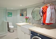 a washer and dryer in a small bathroom