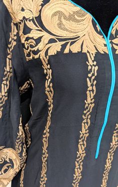 Beautiful Black and blue Shalwar Qameez dress. Perfect for Eid . fits Medium to Large. Bust : 21 Shirt Length :40 * Should be washed in gentle cycle and hung to dry. Color may bleed so please be mindful of other items with it. Formal Lawn Suit With Self Design For Festivals, Fitted Lawn Suit With Straight Kurta For Formal Occasions, Fitted Formal Lawn Suit With Straight Kurta, Formal Fitted Lawn Suit With Straight Kurta, Blue Bollywood Lawn Suit For Formal Occasions, Blue Anarkali Lawn Suit For Formal Occasions, Anarkali Unstitched Long Sleeve Suit For Formal, Anarkali Lawn Suit For Formal Occasions, Formal Semi-stitched Kurta With Printed Motifs