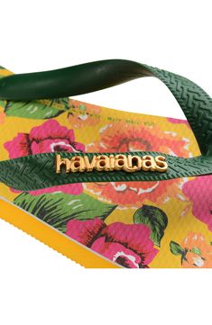 Playful FARM Rio prints adds a splash of tropical fun to this vaycay-ready flip-flop with a pleasing, rice-textured insole and grippy rubber sole. Water-resistant Synthetic upper and lining/rubber and synthetic sole Made in Brazil Tropical Flip Flops For Beach Season, Tropical Vacation Flip Flops, Tropical Style Multicolor Flat Flip Flops, Tropical Multicolor Flat Flip Flops, Tropical Flat Flip Flops For Beach Season, Fun Yellow Flip Flops For The Beach, Fun Yellow Flip Flops For Beach, Sole Water, Farm Rio