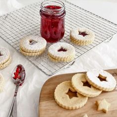 some cookies and jam on a cooling rack