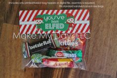 a bag filled with candy on top of a wooden table